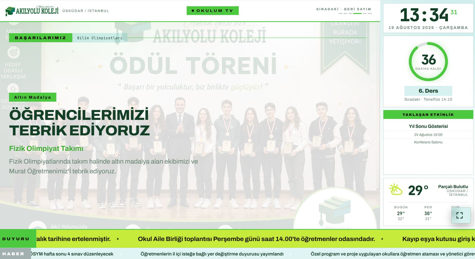 OkulumTV başarı sahnesi: fizik olimpiyat takımının ödül töreni fotoğrafı üzerinde tebrik metni
